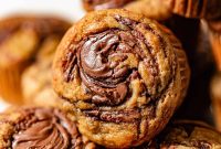 Moist Banana Nutella Muffins with Chocolate Swirl