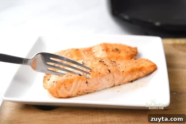 salmon pierced with fork