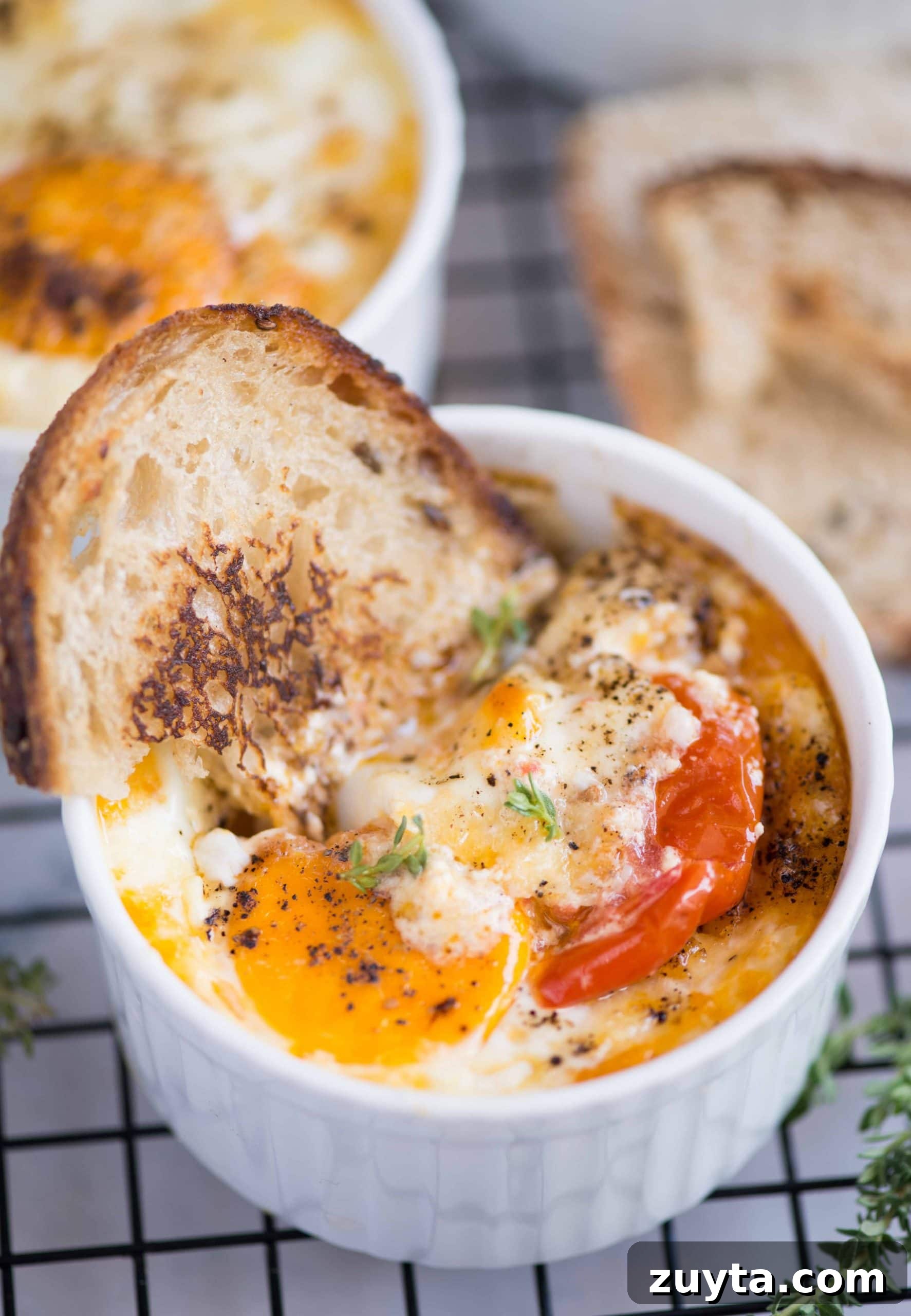 How to Make Shirred Eggs: Baked Egg Recipe 4 These baked eggs with creamy gooey eggs fit perfectly as a quick breakfast or snack.