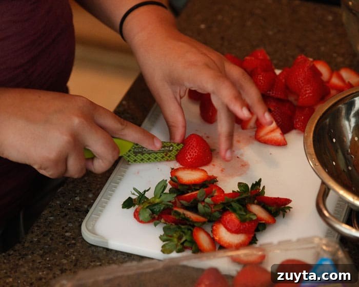 Vanilla French Toast with Homemade Strawberry Syrup 3 slicing-strawberries-00c