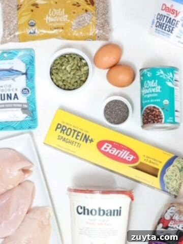 A variety of high protein foods with a white background.
