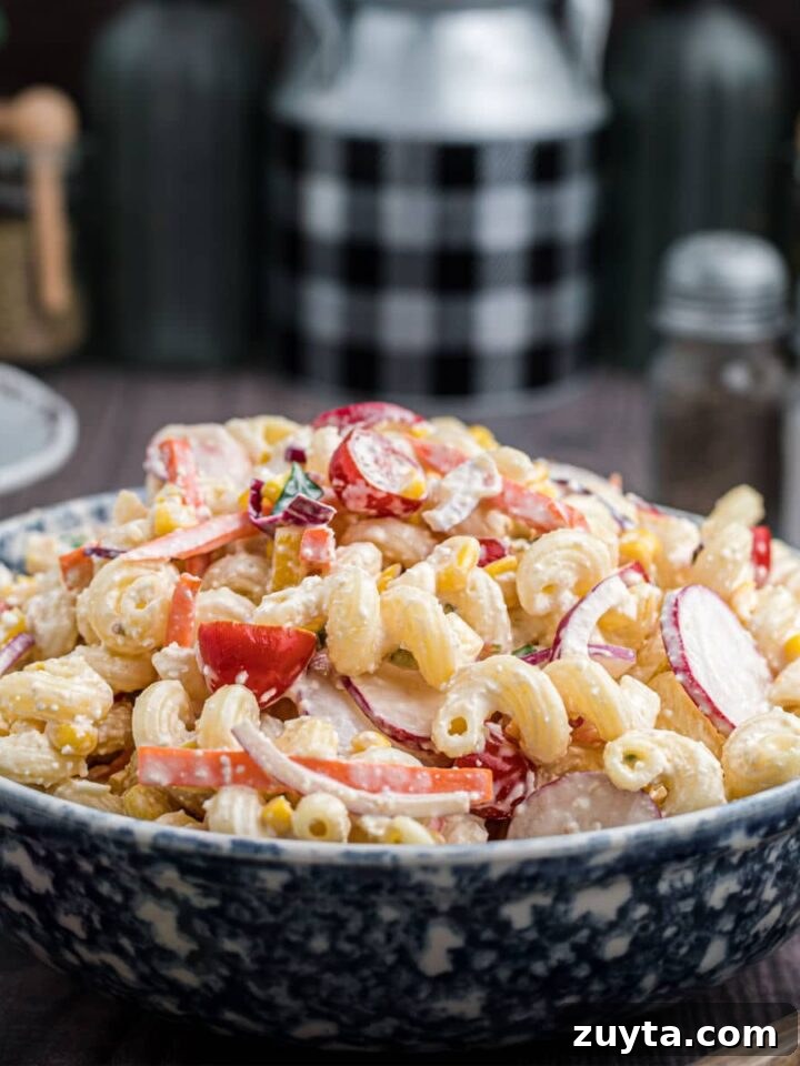 Summer Pesto Pasta Salad with Cherry Tomatoes and Mozzarella 8 summer pasta salad in a bowl