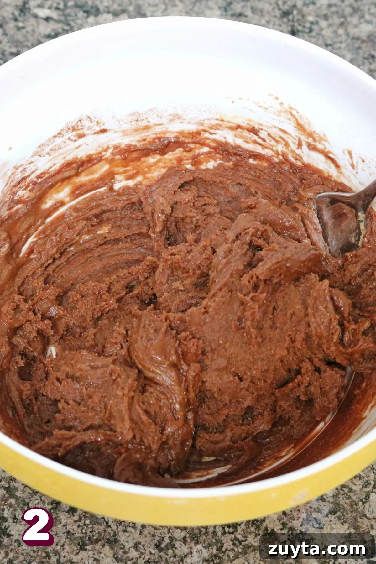 Flourless Peanut Butter and Jam Cookies (Dairy-Free Recipe) 5 Yellow bowl with raw peanut butter chocolate cookie batter.