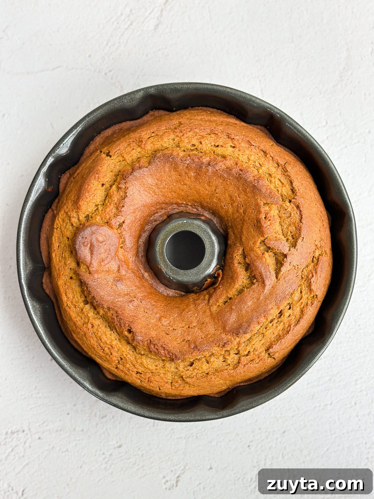 Moist Pumpkin Bundt Cake Recipe with Cinnamon Glaze 7 pumpkin bundt cake after done baking.