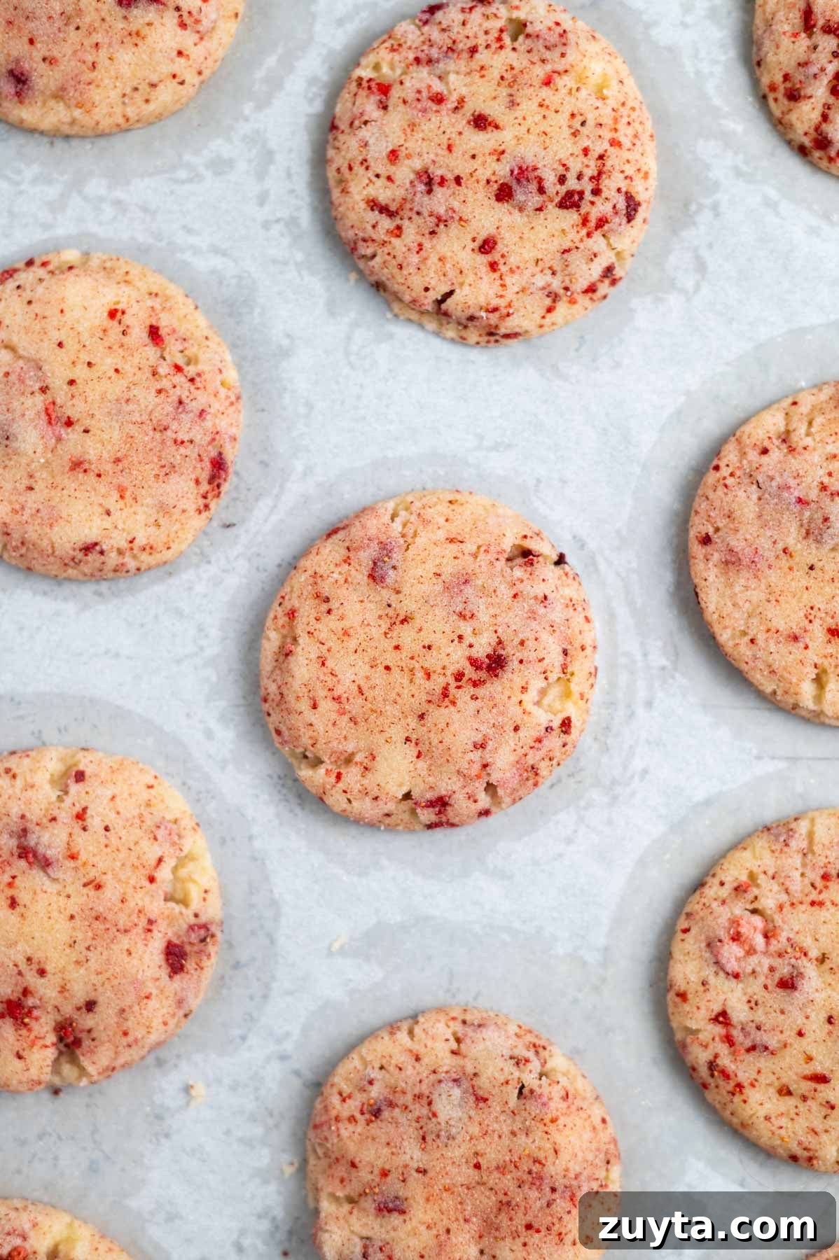 baked cookies on a parchment lined baking sheet