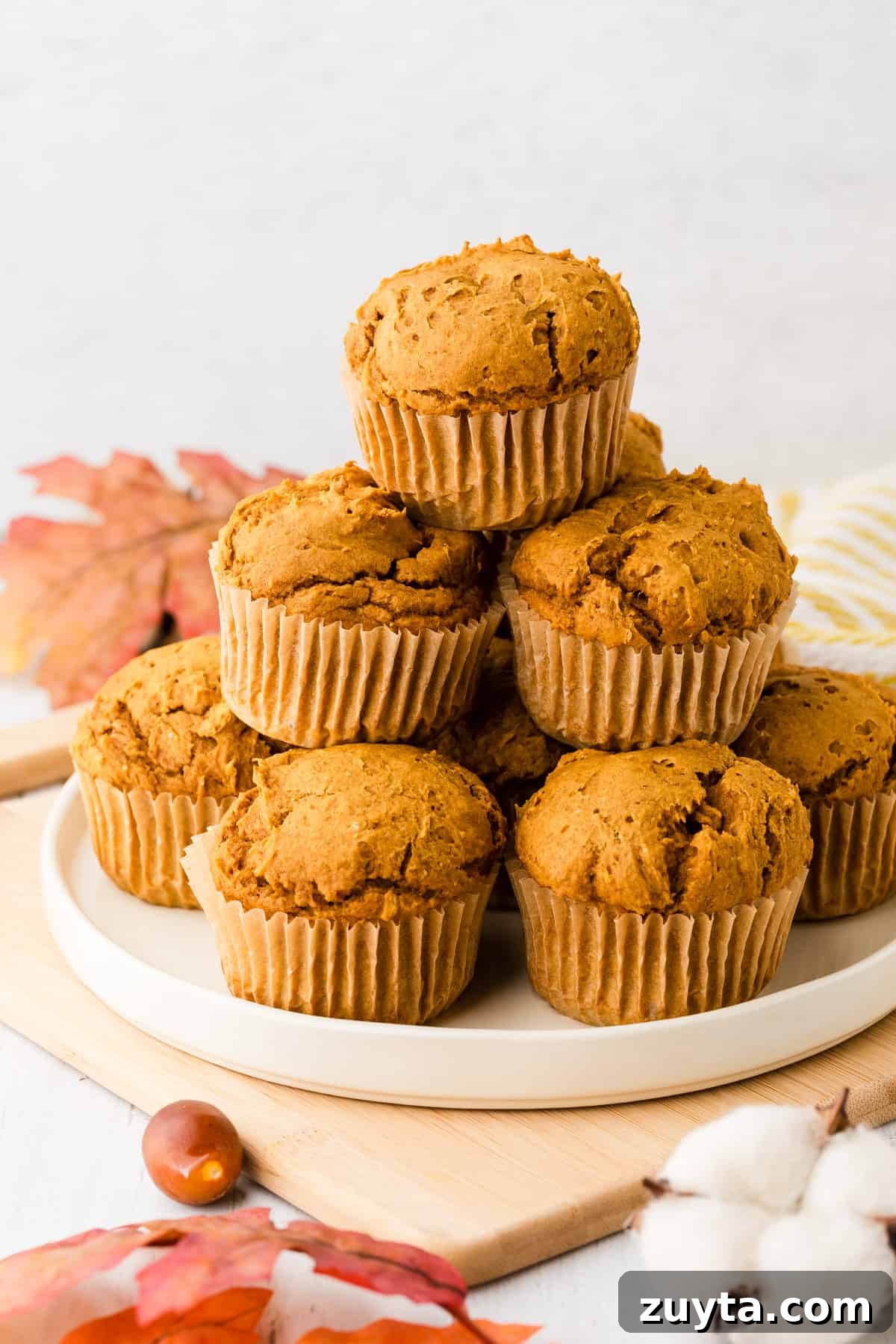 2-Ingredient Pumpkin Muffins Recipe 2 a pile of pumpkin muffins on a plate