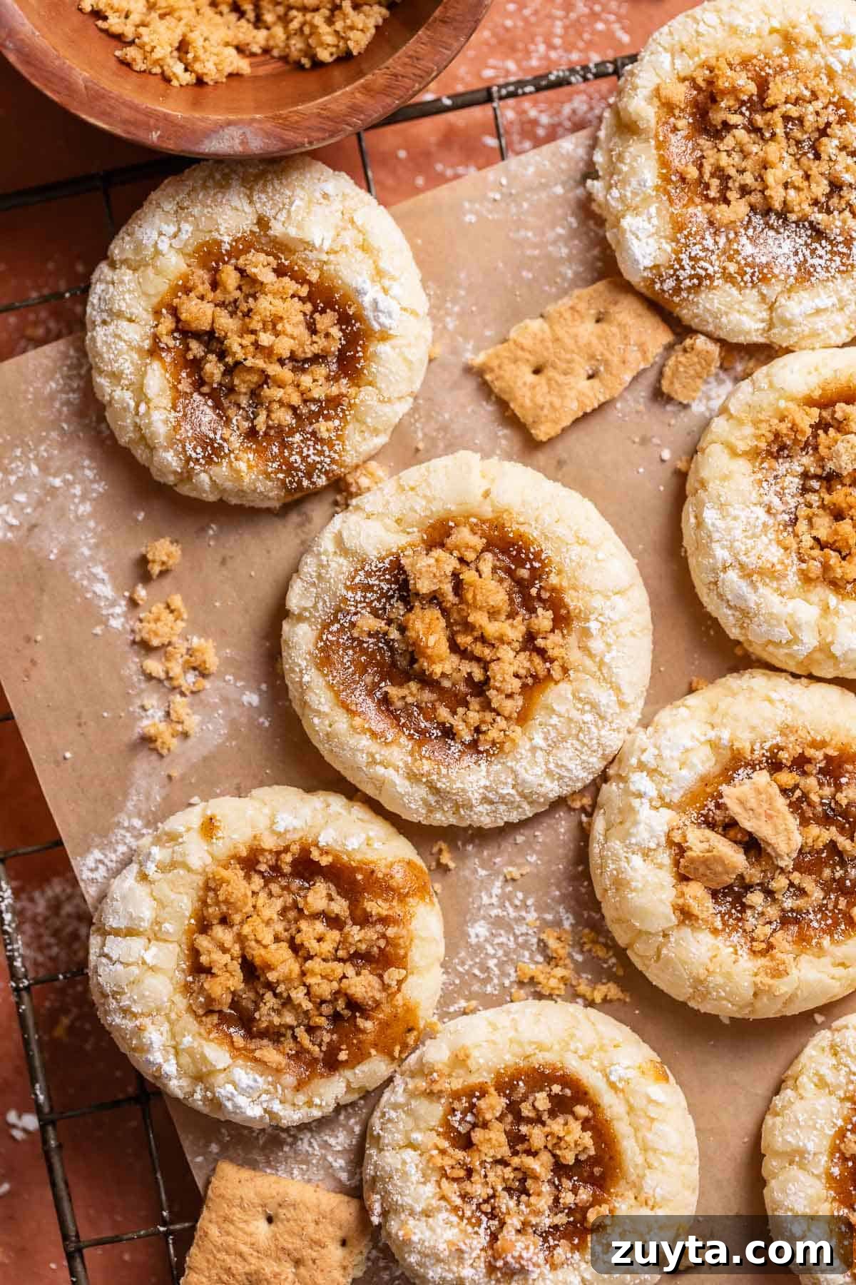 Pumpkin Cheesecake Cookies Recipe 10 Pumpkin cookies with cheesecake filling and graham cracker topping.