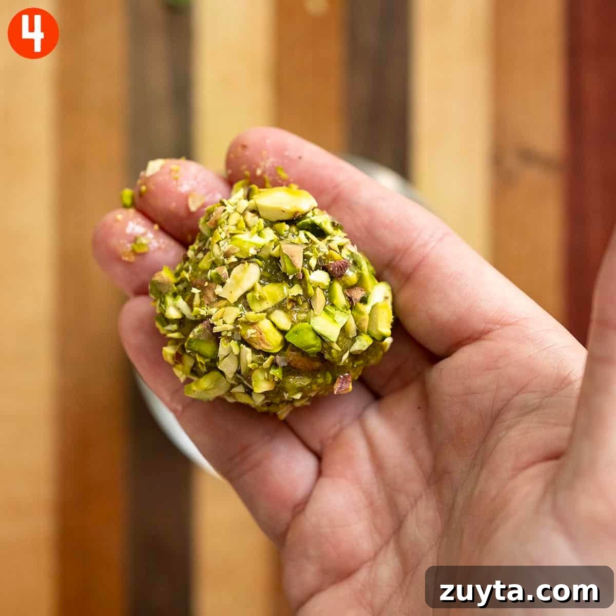 Classic Italian Pistachio Cookies Recipe 7 Rolled pistachio dough rolled in chopped pistachio.