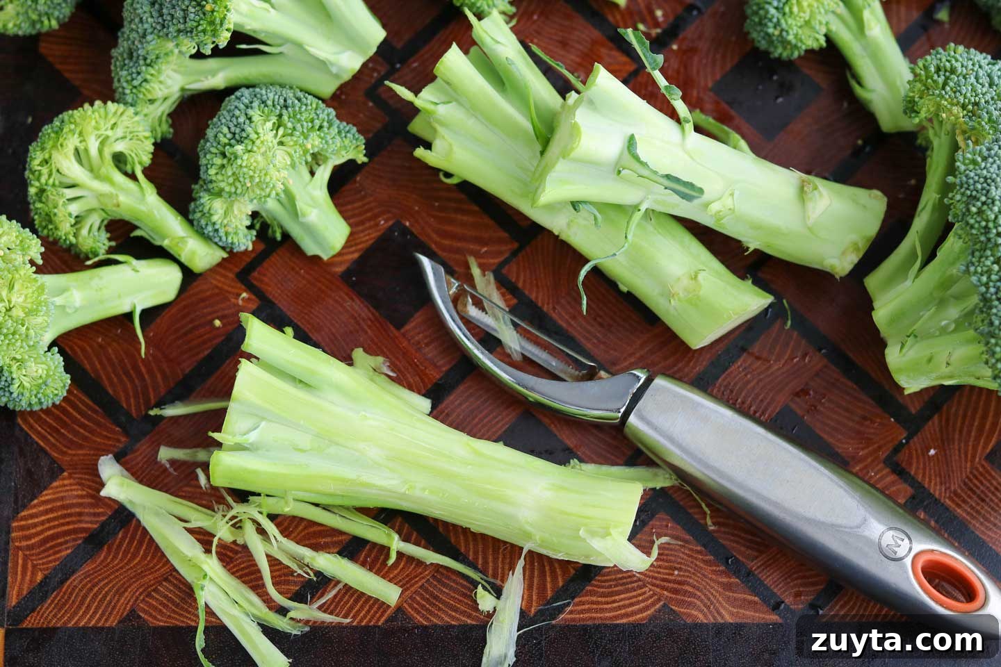 Peel the tough outer layer from the base of the stalks. Peeling broccoli stalks