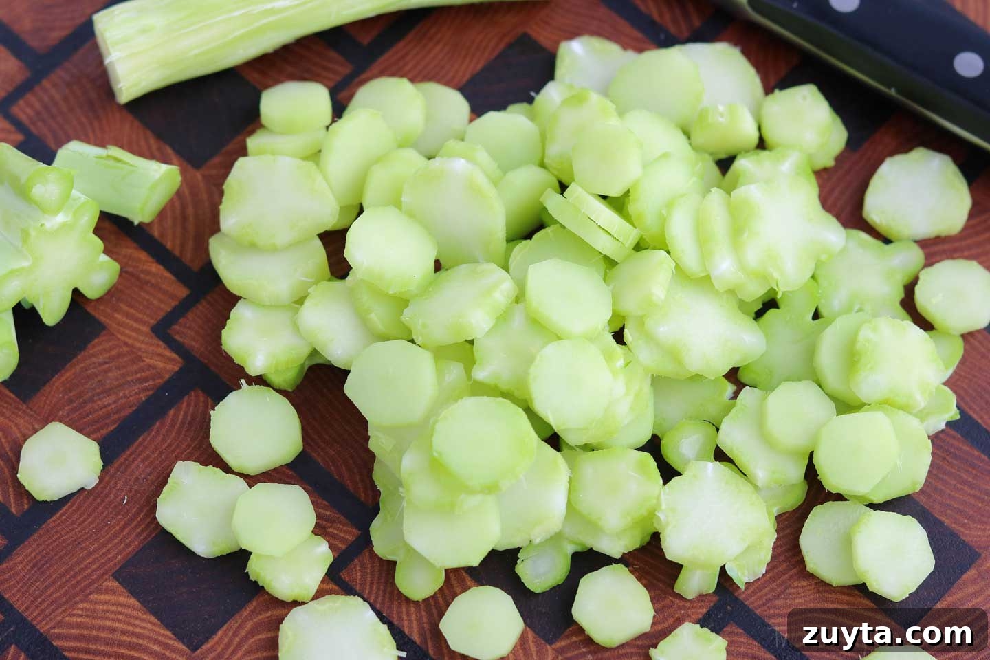 Cut the broccoli stalks into chips about 1/8” thick. Broccoli chips about 1/8 inch thick