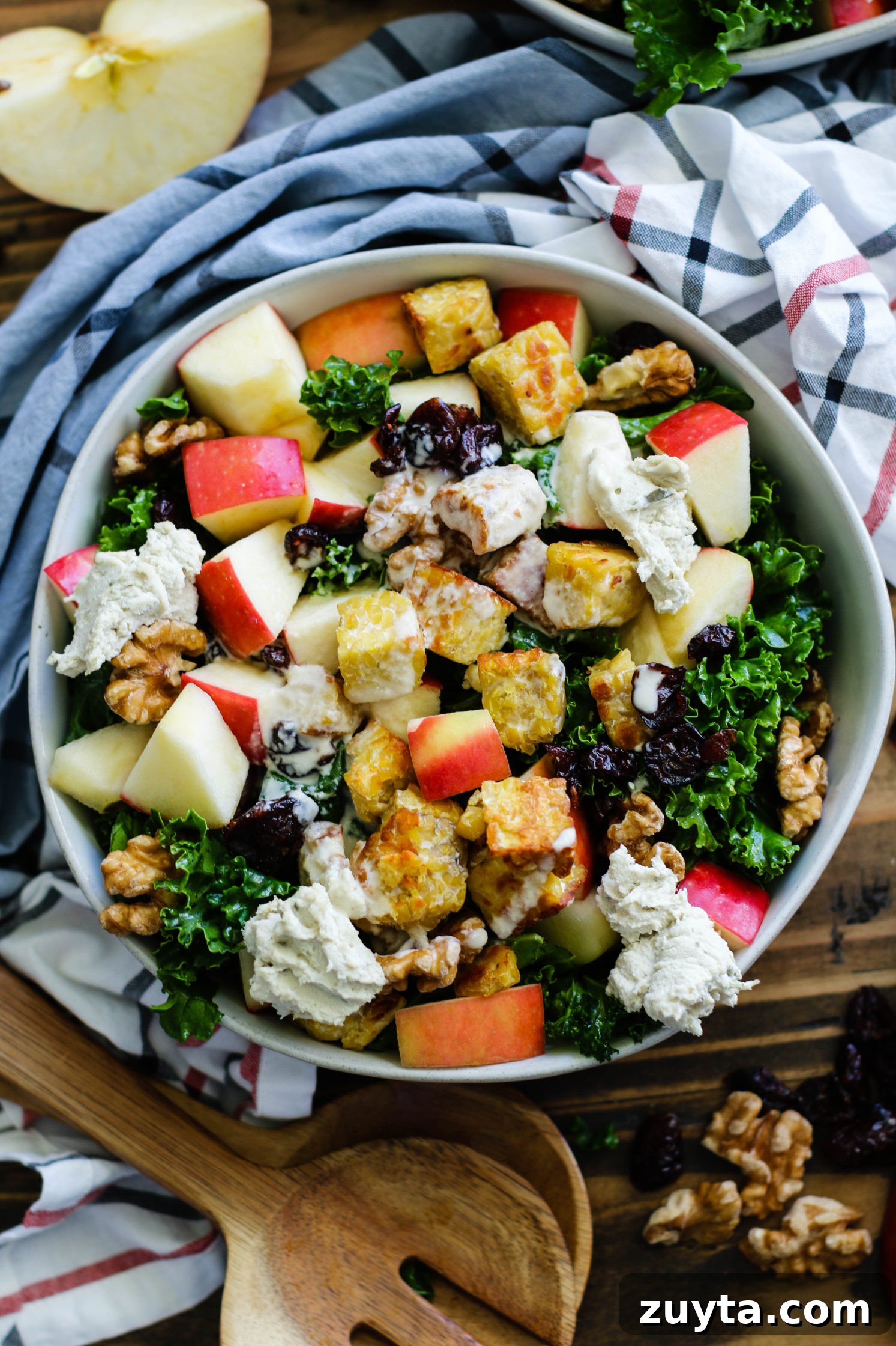 Tempeh and Kale Salad with Cranberries and Apple Recipe 5 Cran-Apple Tempeh Kale Salad served in bowls with tahini dressing by Flora & Vino
