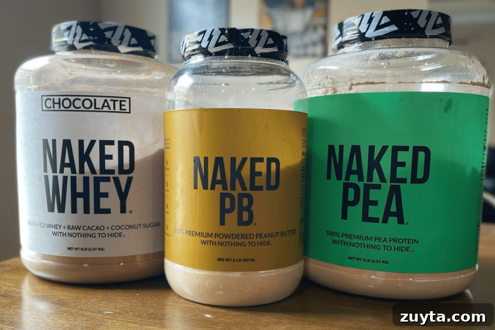 Naked Nutrition Review: Top 3 Protein Powders Compared 2 Naked Nutrition's trio of wholesome protein products: rich chocolate whey protein powder, plant-based pea protein powder, and creamy peanut butter powder.