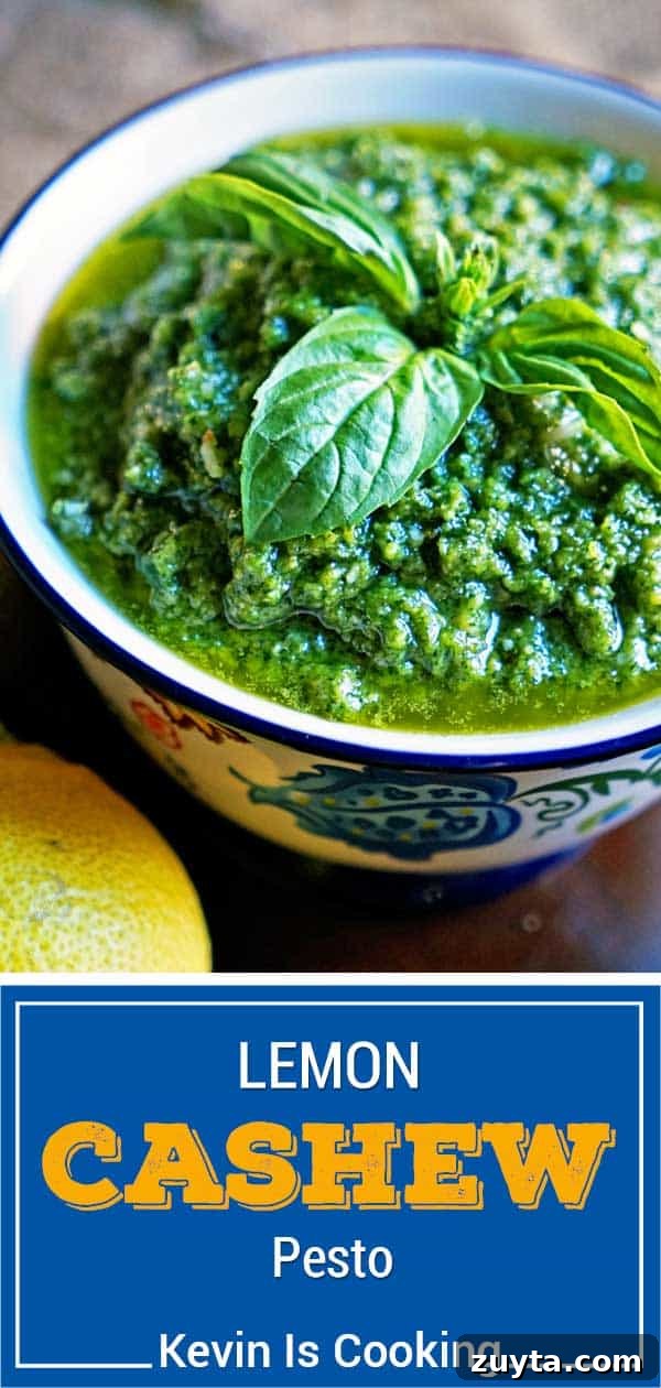 Creamy Lemon Cashew Pesto Recipe 8 lemon cashew pesto in bowl with sprig of basil