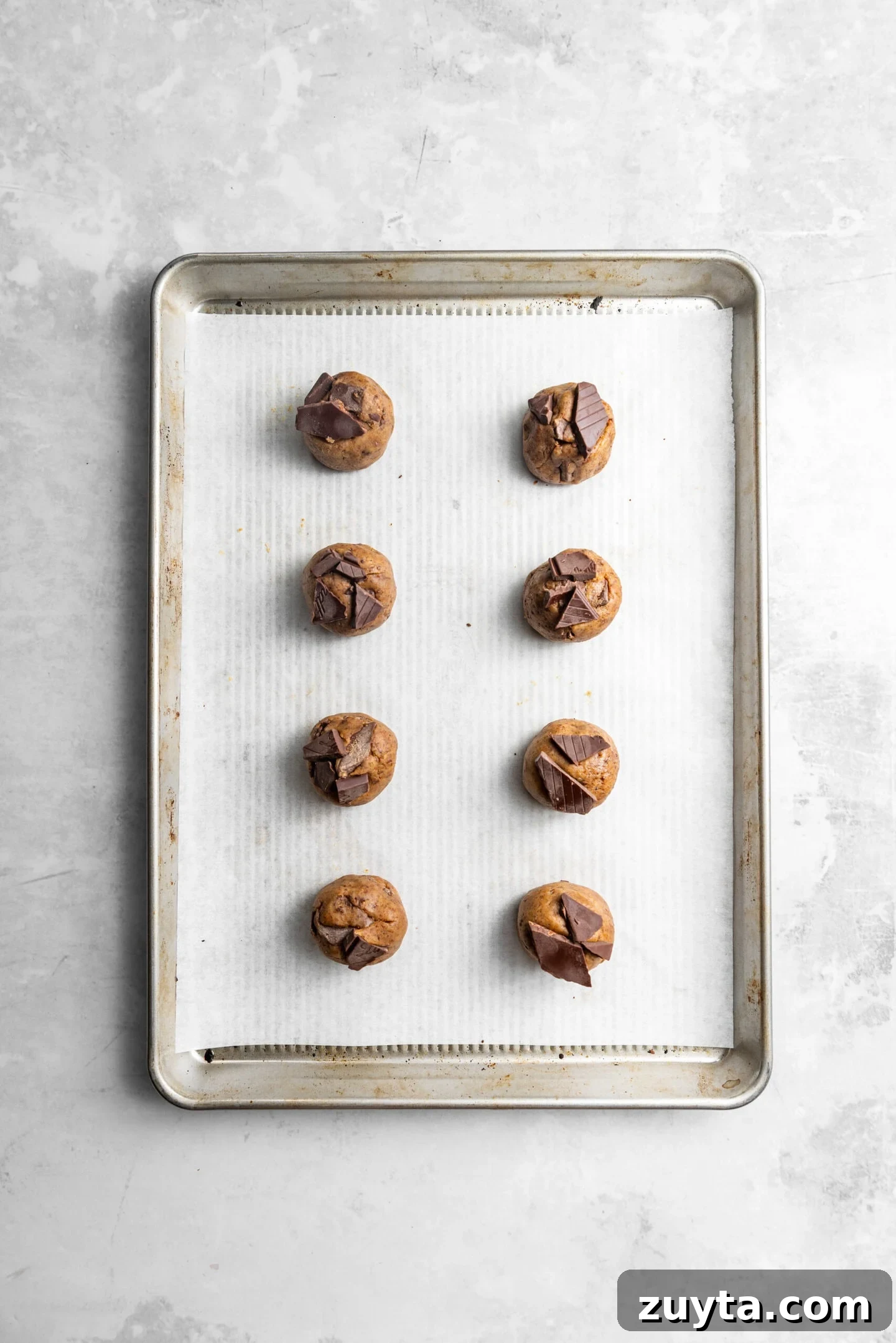 Small-Batch Brown Butter Chocolate Chip Cookie Recipe 11 Cookie dough portioned out into balls on baking sheet