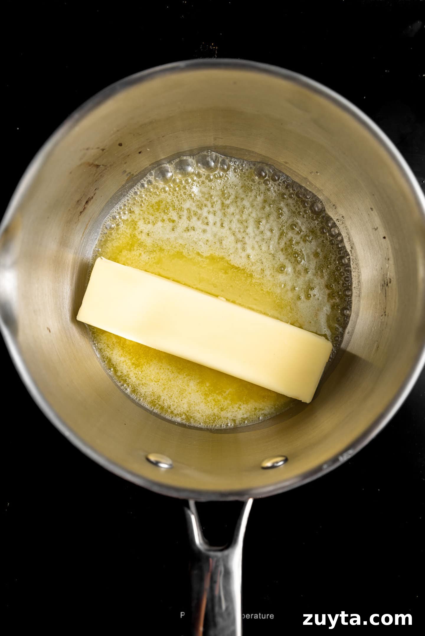Small-Batch Brown Butter Chocolate Chip Cookie Recipe 4 Butter being melted in a saucepan