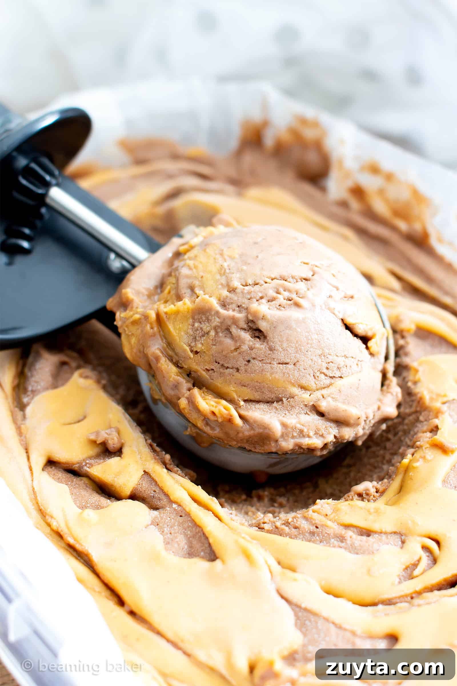 Healthy No Sugar Added Chocolate Peanut Butter Ice Cream (V, DF): a super easy, 5-ingredient recipe for the BEST deliciously creamy and chocolatey no churn peanut butter ice cream. #Vegan #DairyFree #IceCream #Paleo option #HealthyDesserts #PeanutButter #NoSugarAdded #Bananas | Recipe at BeamingBaker.com