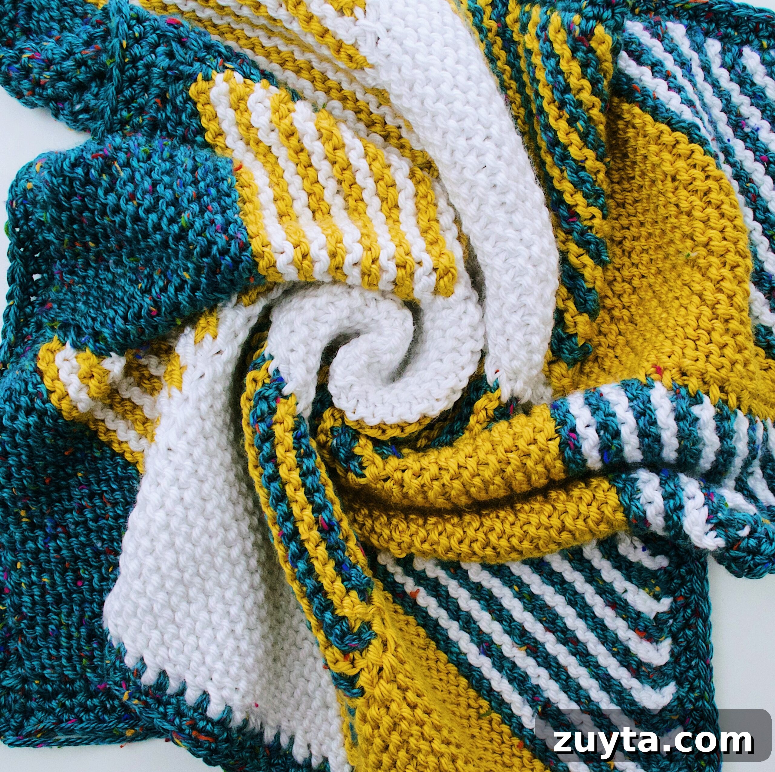 The Knitted Baby Blanket swirled together