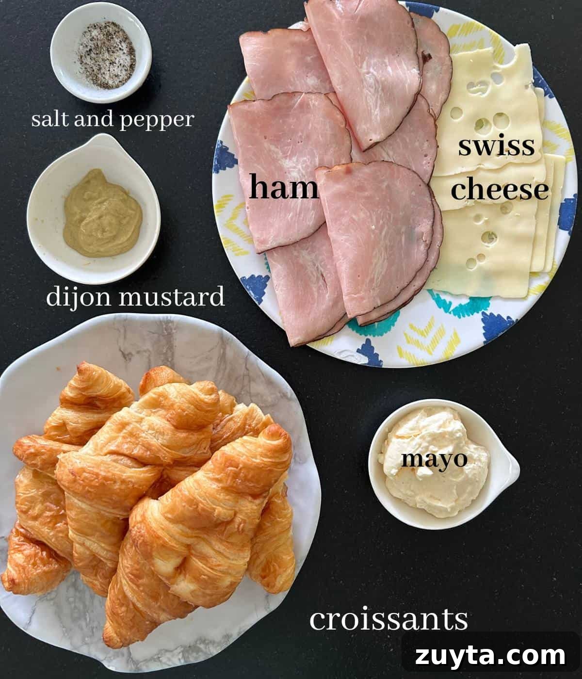 Ingredients for ham and cheese croissants on countertop.