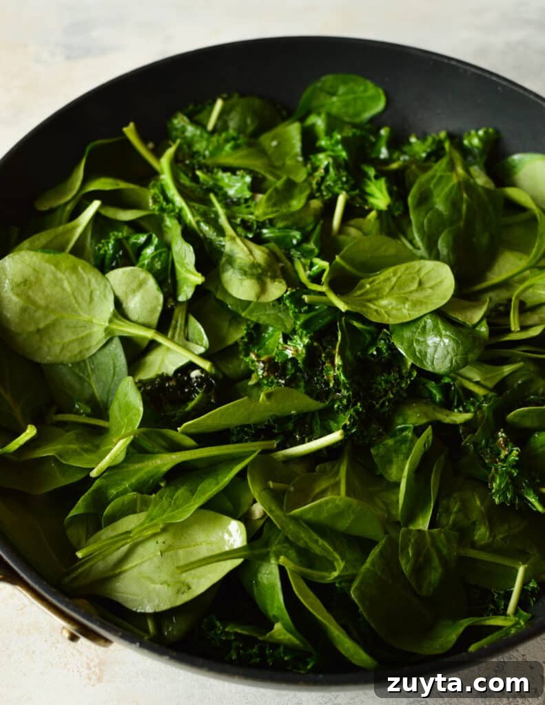 10-Minute Sauteed Kale and Spinach Recipe 5 sauteed kale with spinach mixed in.