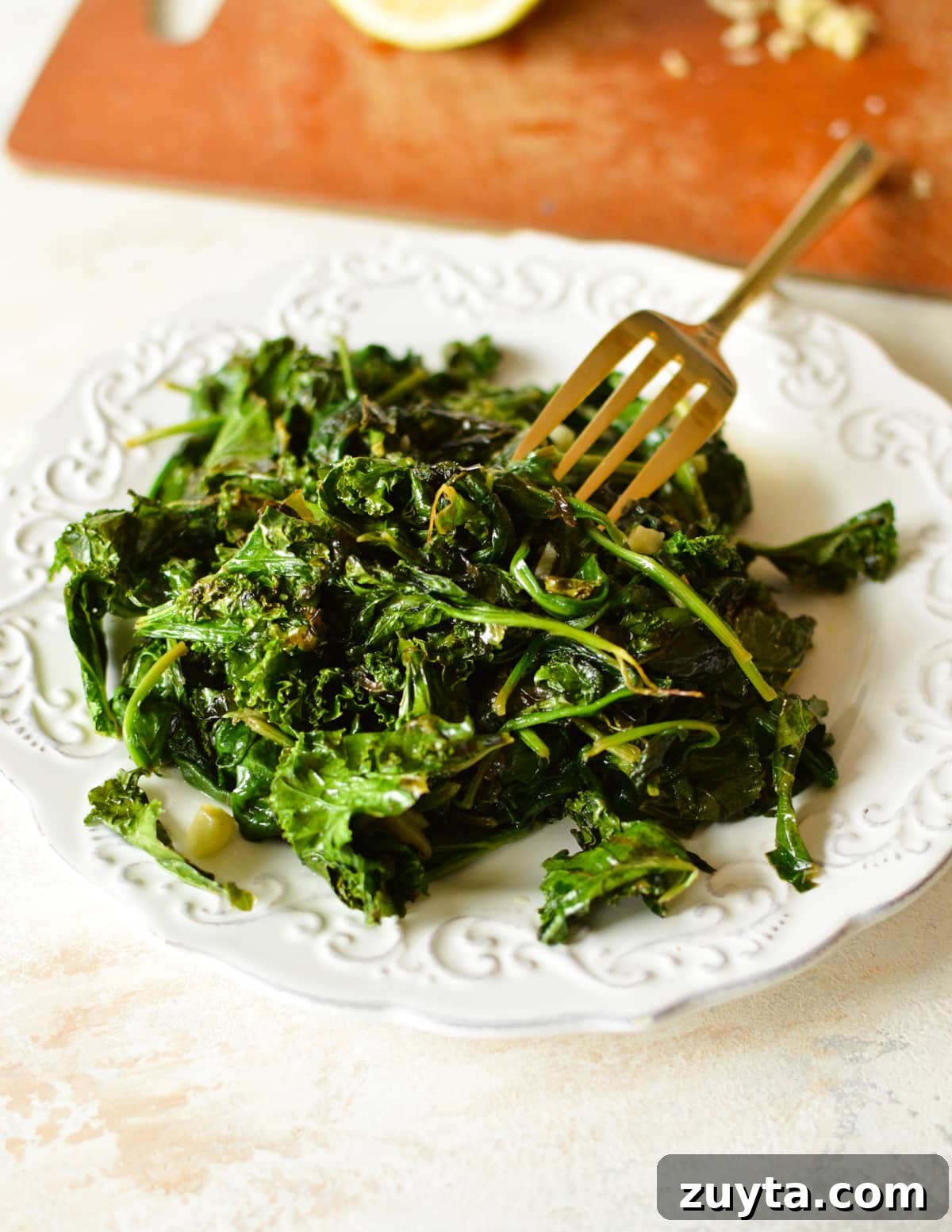 10-Minute Sauteed Kale and Spinach Recipe 6 a plate of sauteed spinach and kale.