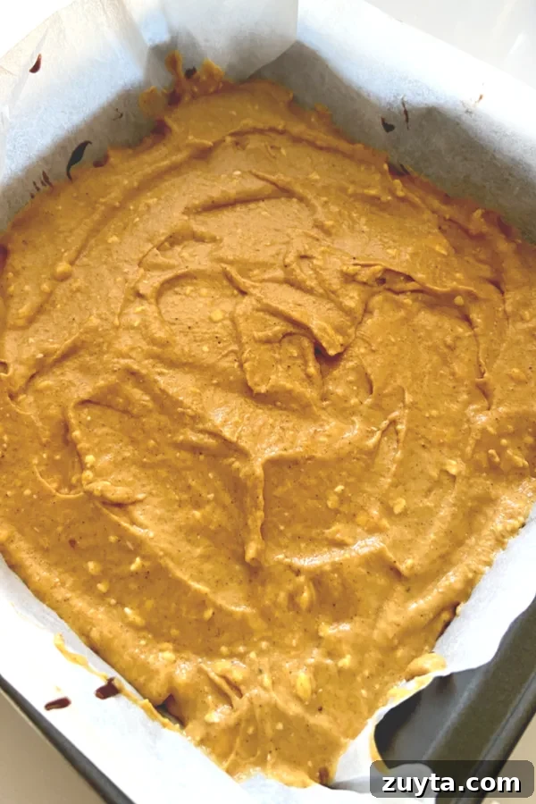 Pumpkin-Stuffed Brownies: Gooey Fall Dessert 3 pumpkin layer