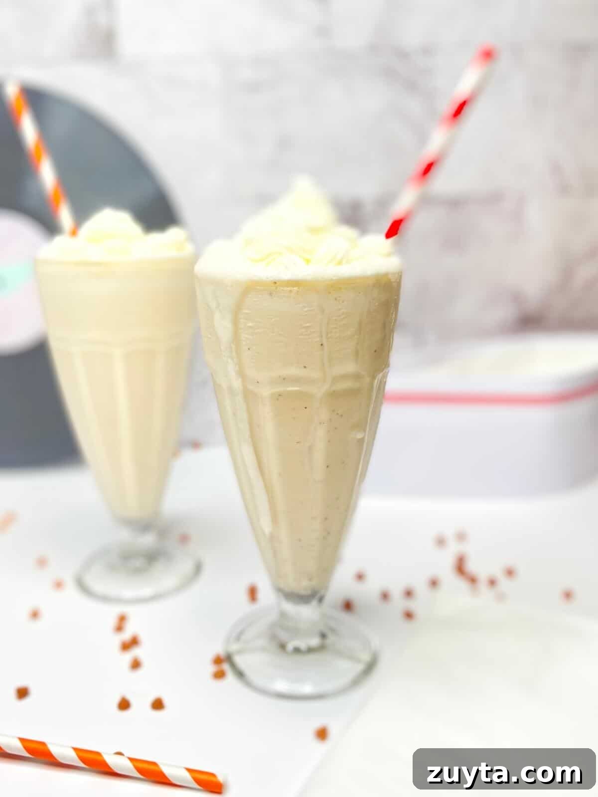 Creamy Butterscotch Milkshake Recipe 4 Two full milkshake glasses.