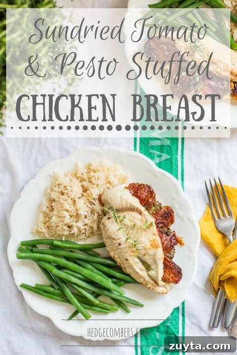 Sun-Dried Tomato Pesto Stuffed Chicken Breast Recipe 2 Sundried Tomato and Pesto Stuffed Chicken Breast on a white plate with basmati rice and green beans