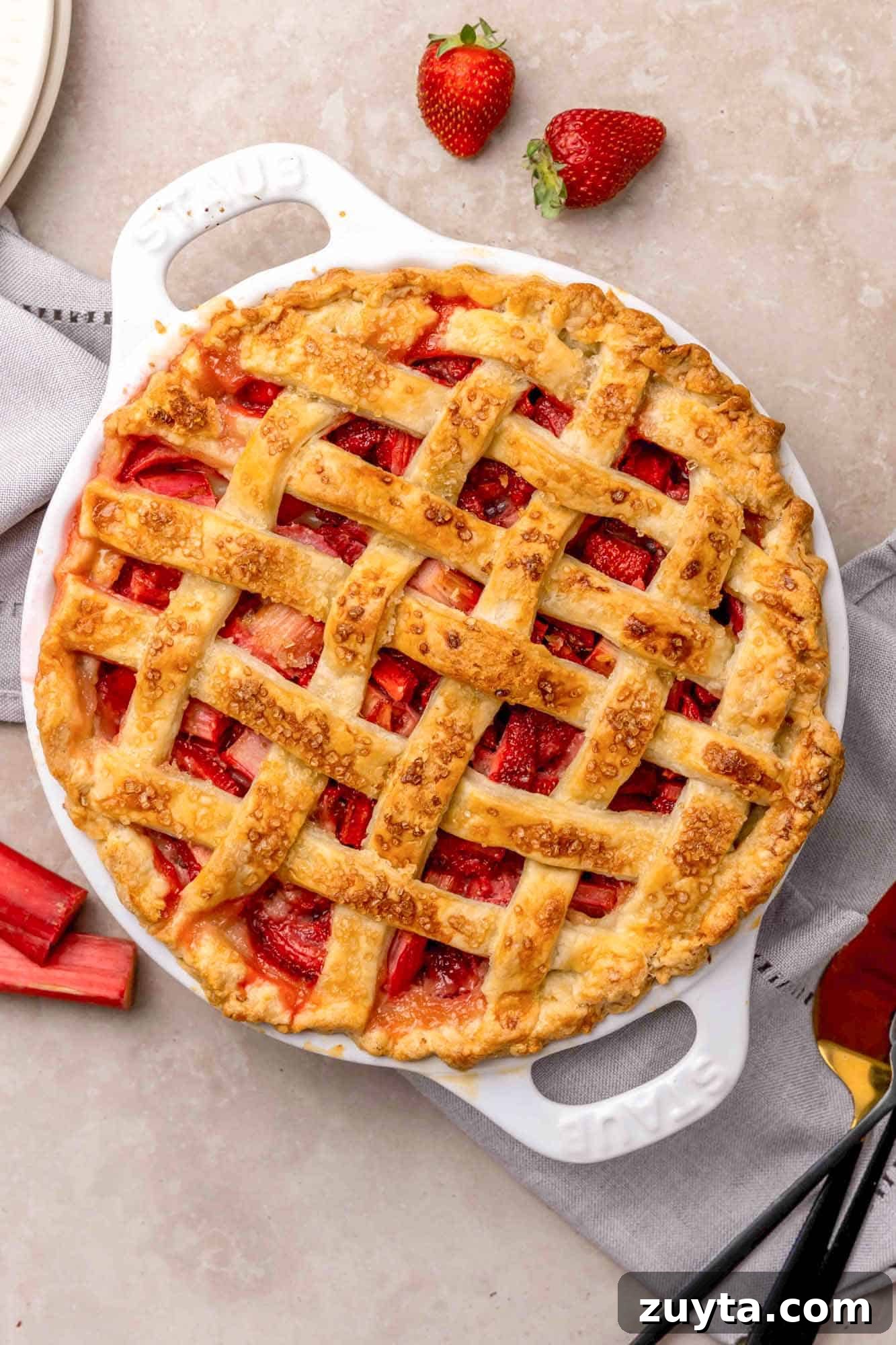 How to Make Strawberry Rhubarb Pie 2 A Strawberry Rhubarb Pie in a white baking dish