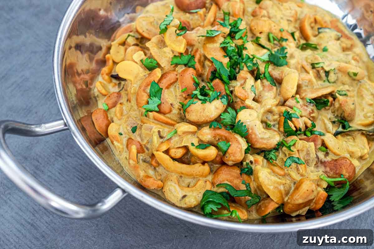 Authentic Sri Lankan Cashew Curry (Kaju Maluwa) Recipe 2 Cashew Nut Curry in a silver bowl