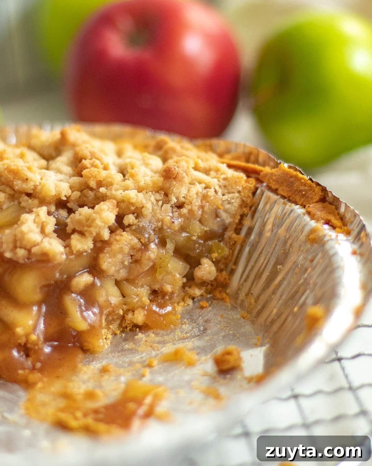 apple pie with graham cracker crust and crumb topping