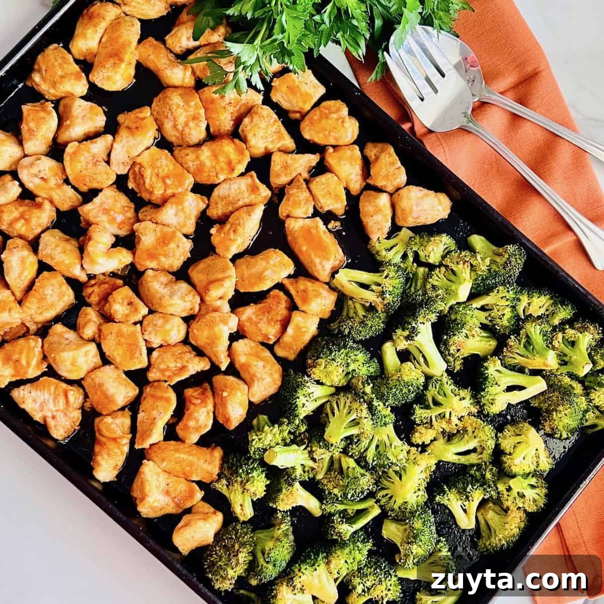 Sheet Pan Dinner Recipes for Quick Weeknight Meals 12 Pan of buffalo chicken and broccoli.