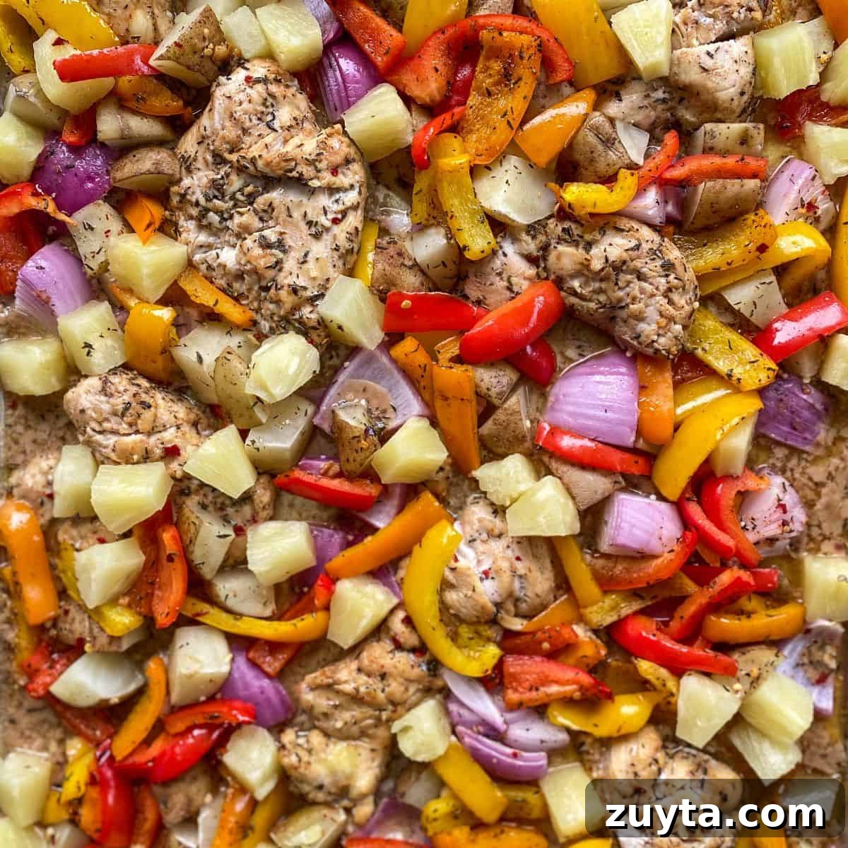 Sheet Pan Dinner Recipes for Quick Weeknight Meals 3 Chicken and veggies on a sheet pan.