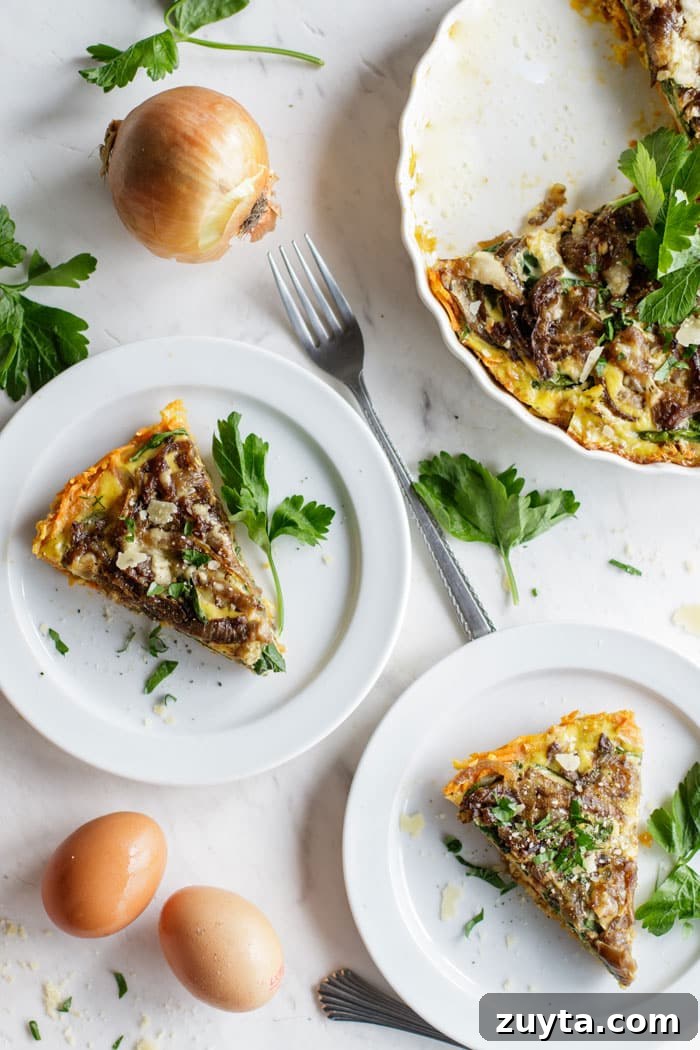 Sweet Potato and Spinach Frittata Recipe with Caramelized Onions 2 Two plates with slices of sweet potato frittata sprinkled with parsley.