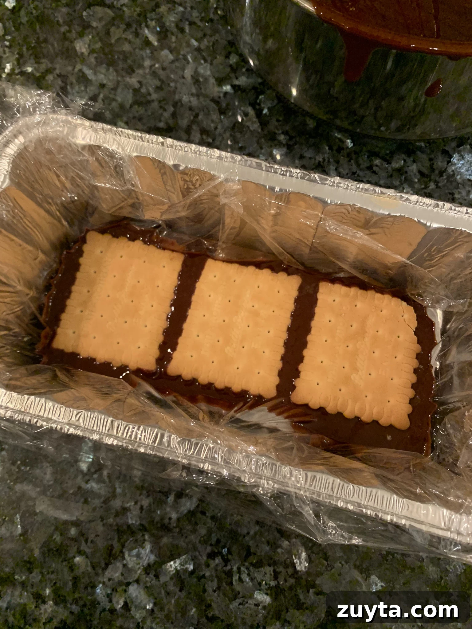 Layering process with cookies and chocolate mixture