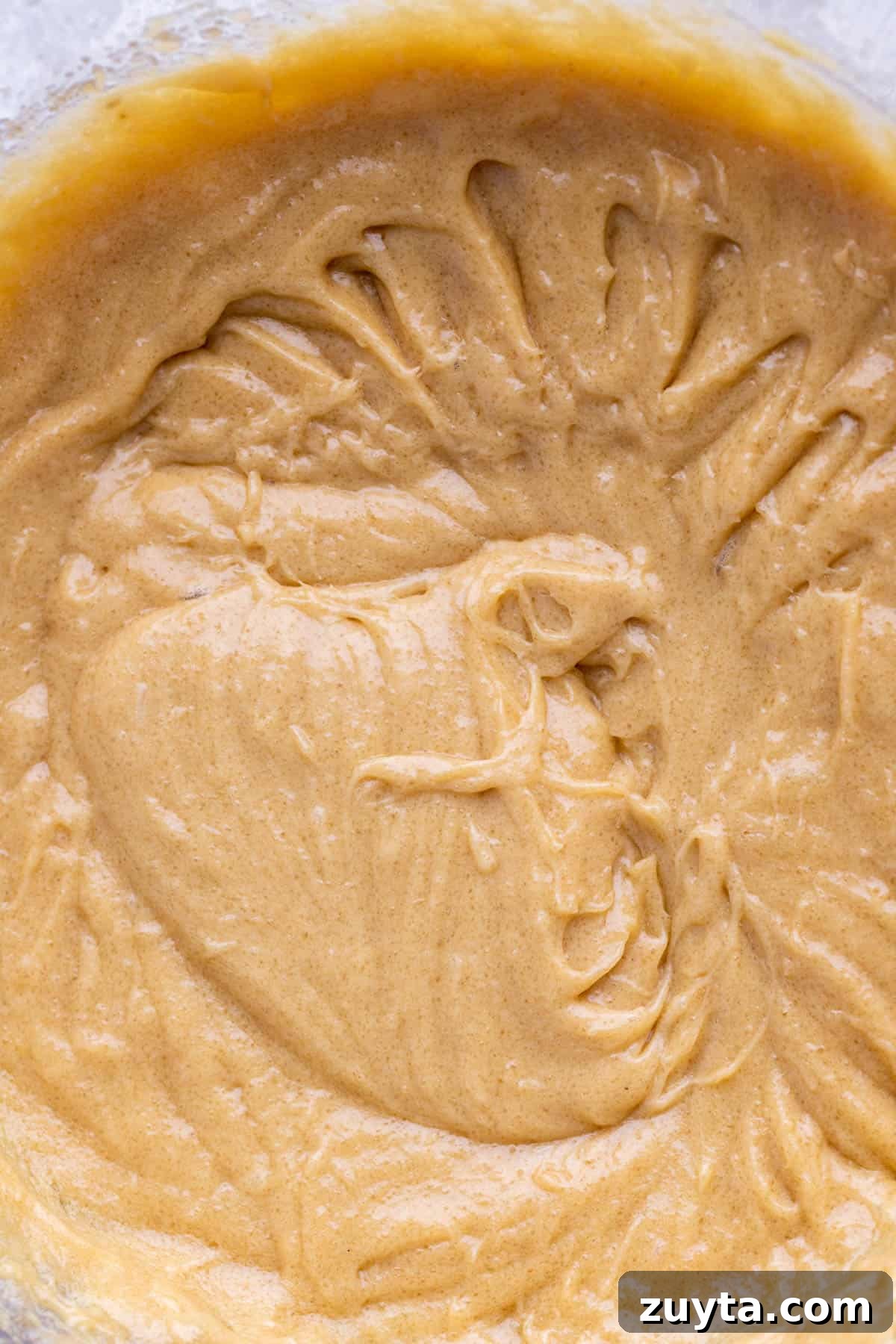 Wet ingredients in a bowl.