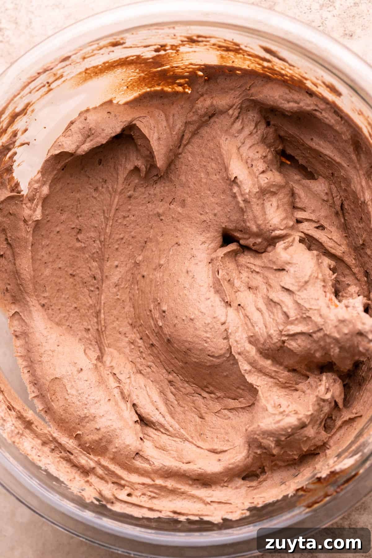 Chocolate pie filling in a glass bowl.