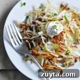 Golden crispy hash browns on a plate