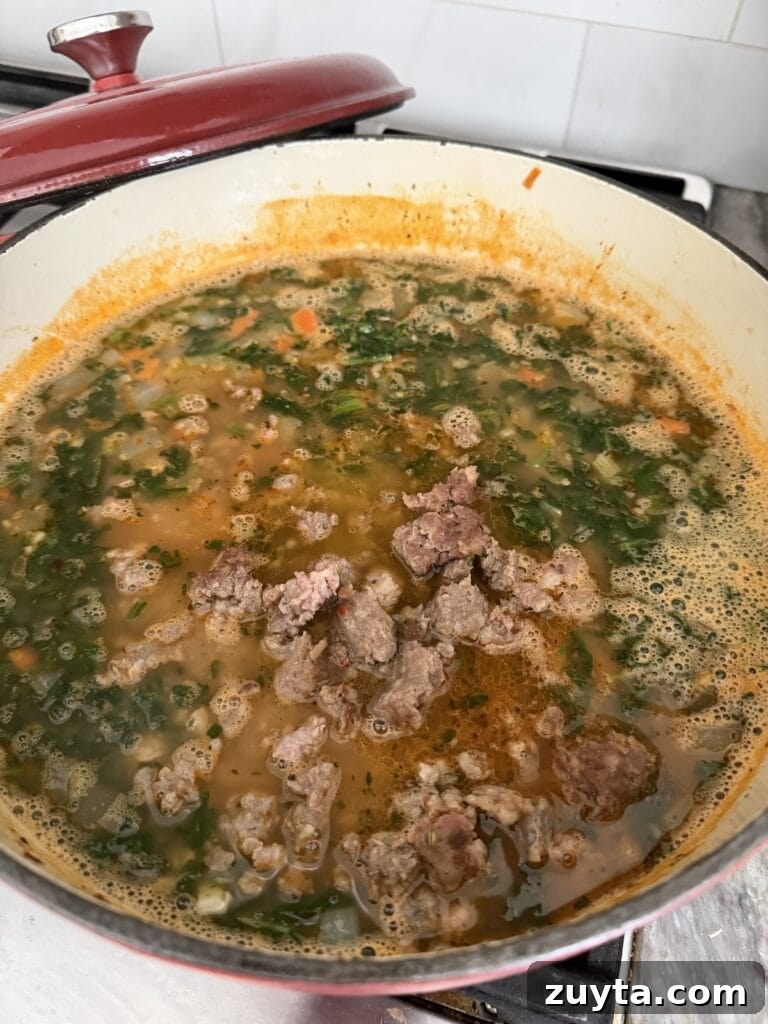One-Pot White Bean and Sausage Soup 11 Final simmering of the Cannellini Bean Soup with Sausage.