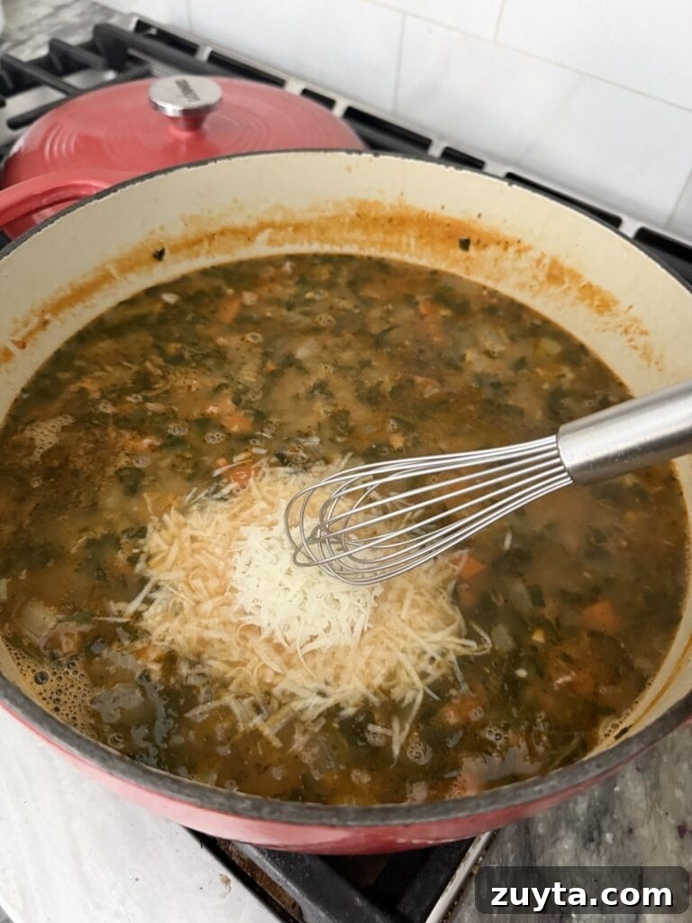 One-Pot White Bean and Sausage Soup 12 Whisking grated cheese into the Italian Sausage White Bean Soup .