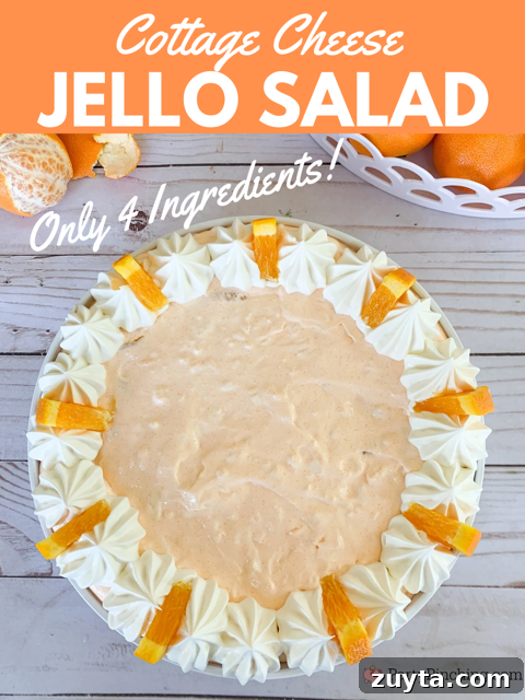 Classic Cottage Cheese Jello Salad Recipe 2 cottage cheese jello salad, easy 5 minute jello salad, orange fluff salad, 4 ingredient salad, creamsicle salad, easiest salad for summer, orange fluff dessert, cottage cheese dessert, vintage dessert salad recipe ideas, easy best potluck dessert salad side dishes