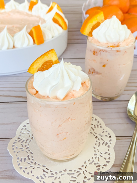 Classic Cottage Cheese Jello Salad Recipe 3 cottage cheese jello salad, easy 5 minute jello salad, orange fluff salad, 4 ingredient salad, creamsicle salad, easiest salad for summer, orange fluff dessert, cottage cheese dessert, vintage dessert salad recipe ideas, easy best potluck dessert salad side dishes