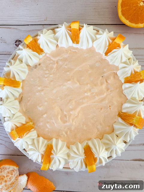 Classic Cottage Cheese Jello Salad Recipe 9 cottage cheese jello salad, easy 5 minute jello salad, orange fluff salad, 4 ingredient salad, creamsicle salad, easiest salad for summer, orange fluff dessert, cottage cheese dessert, vintage dessert salad recipe ideas, easy best potluck dessert salad side dishes