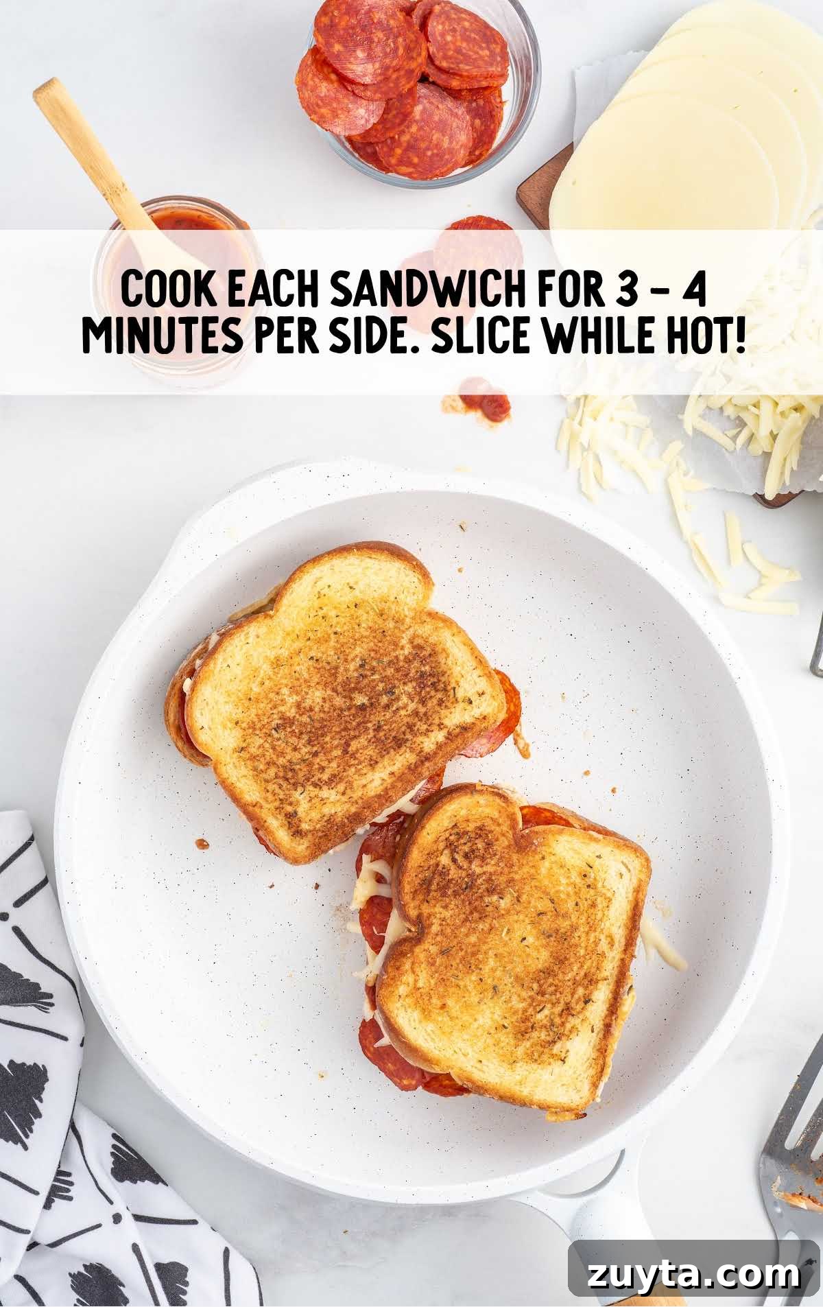 both sides of the sandwich cooked on a skillet