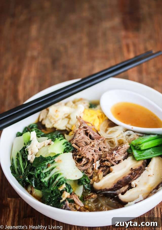 How to Make Authentic Spicy Korean Beef Noodle Soup 2 Spicy Korean Beef Noodle Soup - made with rich beef bone broth and spiced up with red pepper flakes, this Asian noodle soup will warm up your belly