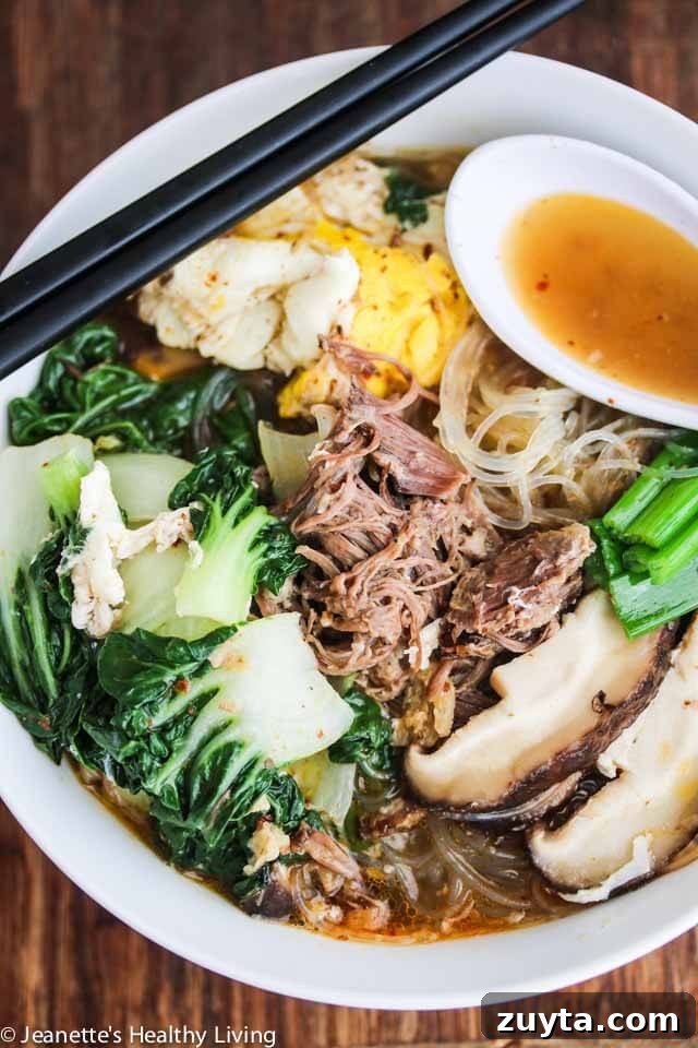 How to Make Authentic Spicy Korean Beef Noodle Soup 4 Spicy Korean Beef Noodle Soup - made with rich beef bone broth and spiced up with red pepper flakes, this Asian noodle soup will warm up your belly