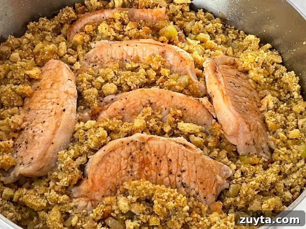 Foolproof Pork Chop Recipes for Juicy Weeknight Dinners 10 Stuffing and pork chops in a frying pan.