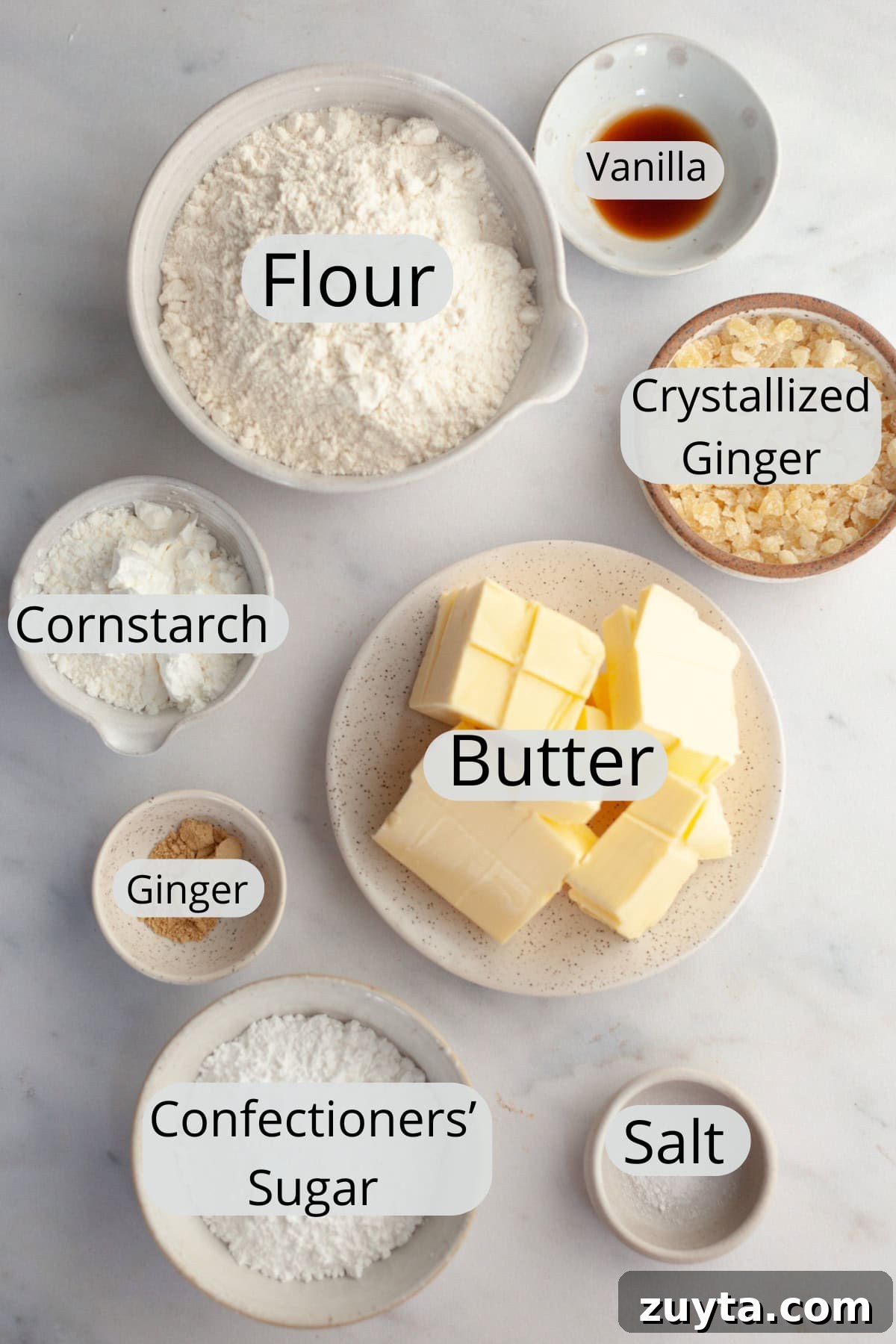 Double-Ginger Shortbread Cookies Recipe 3 All the ingredients needed to make ginger shortbread cookies, weighed out into small bowls.
