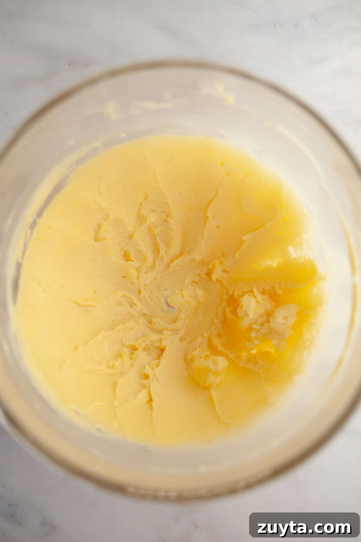 Double-Ginger Shortbread Cookies Recipe 4 Creamed butter and sugar in a glass bowl.
