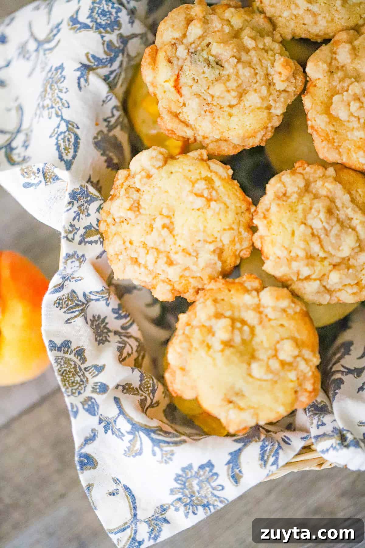 Peach Muffins with Crumble Topping Recipe 3 ingredients laid out for bakery style vanilla peach muffins recipe