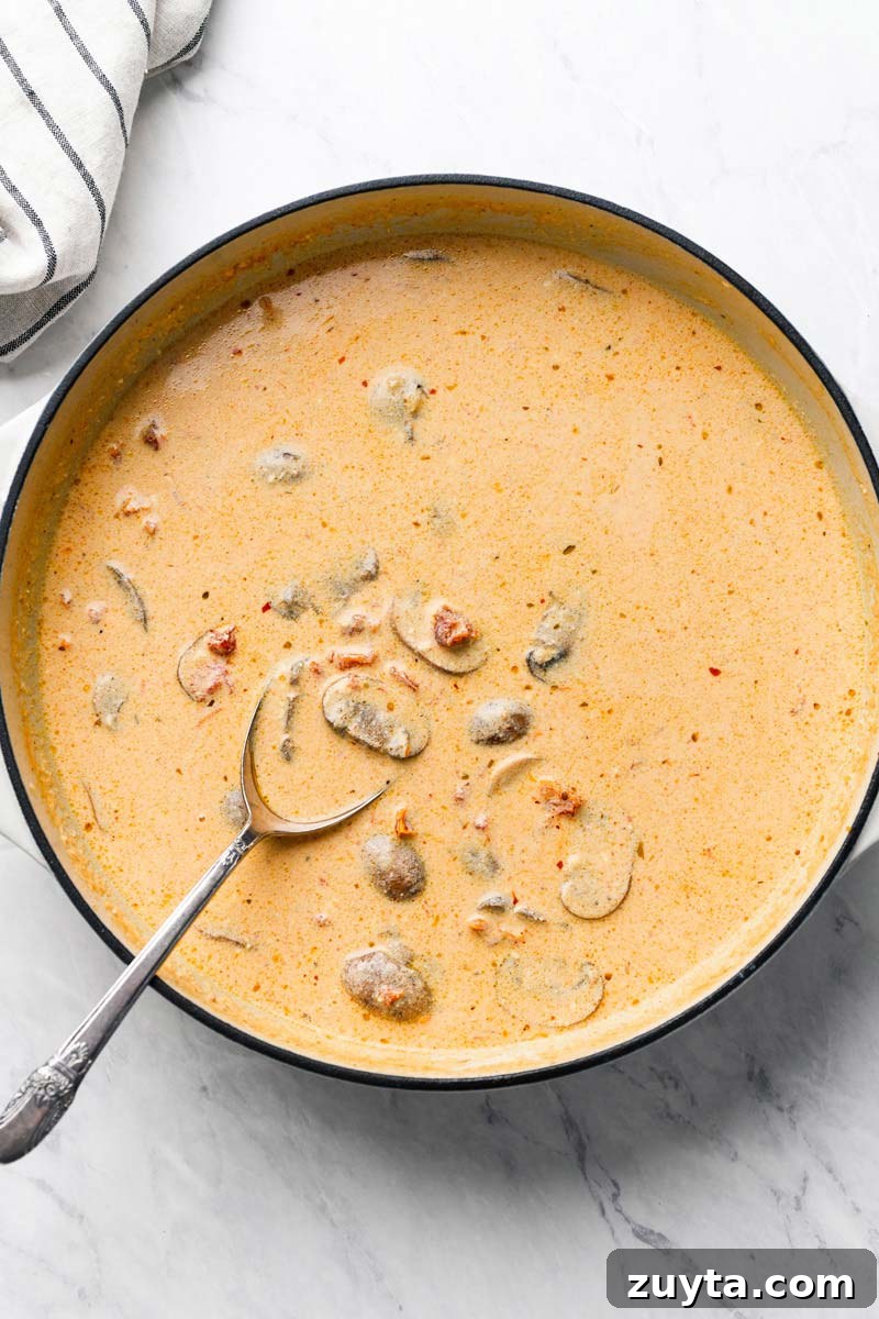 Creamy Chicken and Mushroom Pasta Recipe 2 creamy mushroom sauce in a skillet
